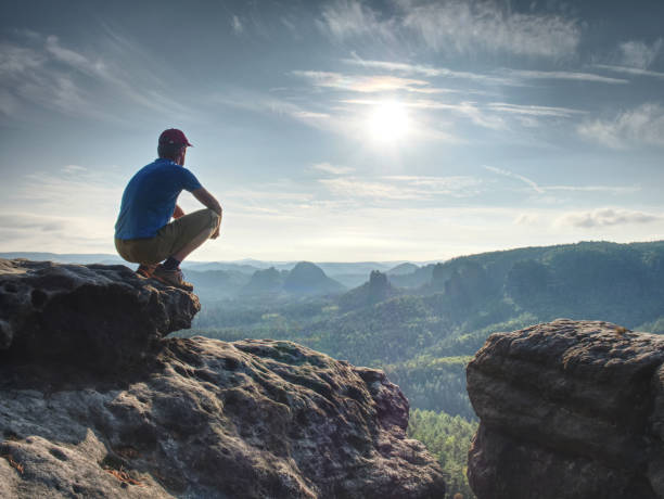 istock Hiker watching to Sun at horizon. Beautiful moment the miracle 1047514664