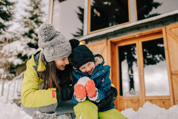 istock Day on a snow with my mom 1047515052