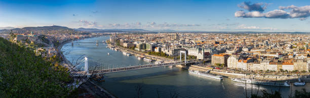 istock Panoramic look down from Gellert hill to castle hill, Danube river with parliament building, Elisabeth Bridge and Chain Bridge in Budapest, Hungary 1047517916