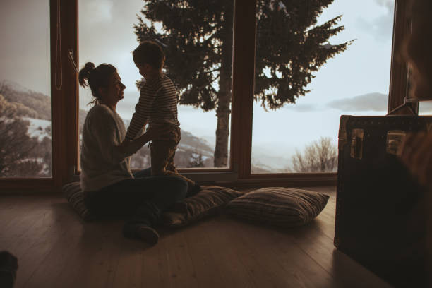 istock Winter vacation in a log cabin 1047517972