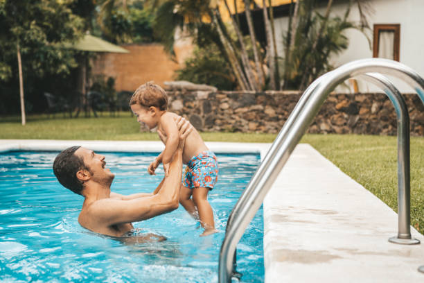 istock Family at the pool 1047518192