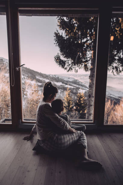 istock Winter vacation in a log cabin 1047519634