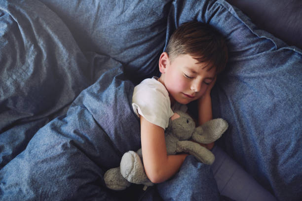 istock He needs to rest after a long day of play 1047523936