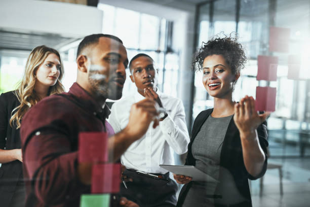 istock Nothing encourages collaboration like brainstorming 1047529714