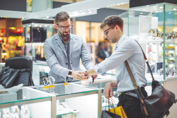 istock Young man is shopping for a watch 1047532874