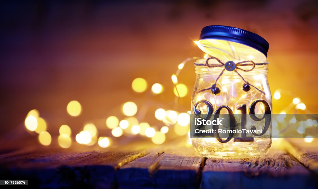 Open 2019 - Christmas Lights In The Jar - Blurred Background 2019 - Christmas String In The Jar With Bokeh 2019 Stock Photo