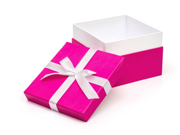 istock Purple gift box with white ribbon isolated on white background. Clipping path 1047539502