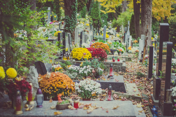 istock cemetery decorated at All Saints Day time 1047541992