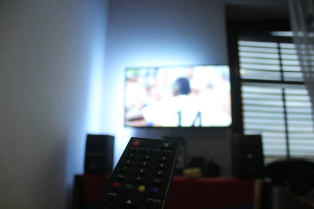 istock Watching tv at bedroom 1047544730