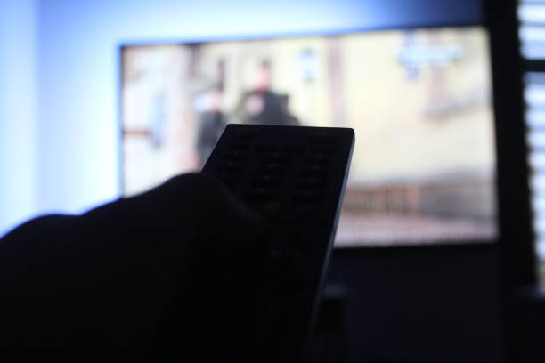 istock Watching tv at bedroom 1047544758