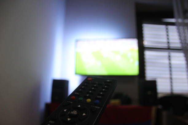 istock Watching tv at bedroom 1047545008
