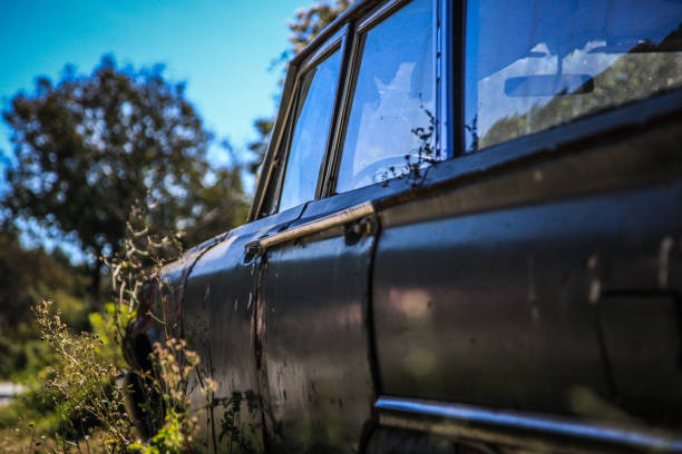 istock Rust oldtimer car - Ruined Cars on the Station 1047549772