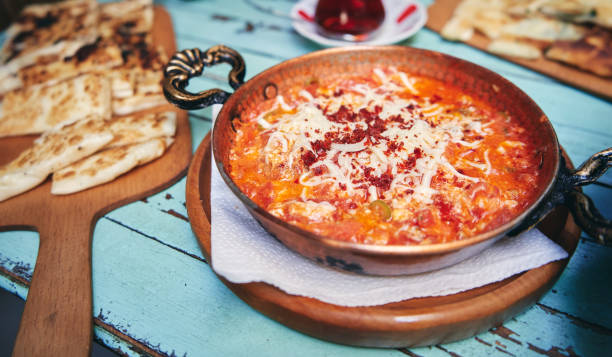 Traditional turkish food menemen made by eggs and tomatoes stock photo