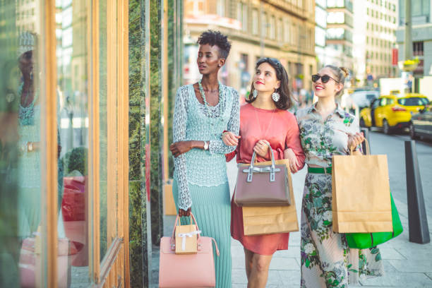 istock Friends are window shopping 1047557608