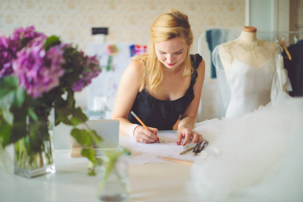 istock Fashion designer is making new sketches 1047558422