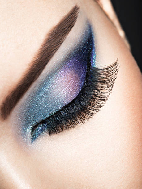 istock Woman's eye with blue eye makeup 1047558736