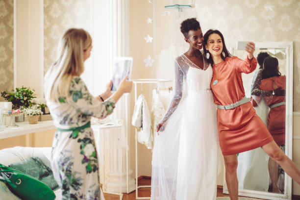 istock The bride is trying out her wedding dress 1047558888