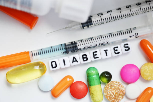 Syringe and medical drugs for diabetes, metabolic disease treatment stock photo