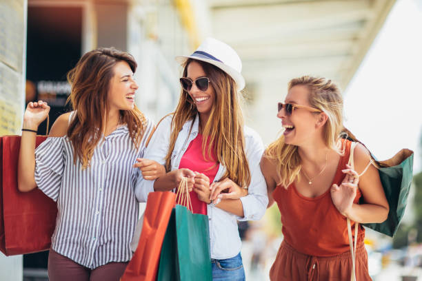 istock Three women shopping together. 1047562154