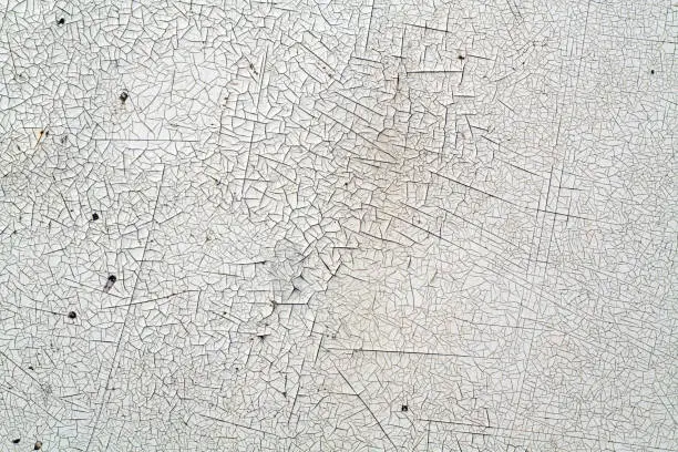 Photo of Crack and damage on painted texture.