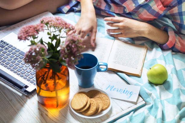 background - beautiful cozy morning and girl reading book\