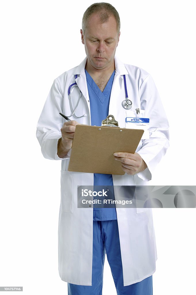 Médico escrevendo notas - Foto de stock de Acidentes e desastres royalty-free