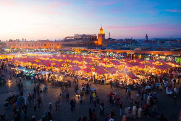 istock Evening Djemaa El Fna Square with Koutoubia Mosque, Marrakech, Morocco 1047575316