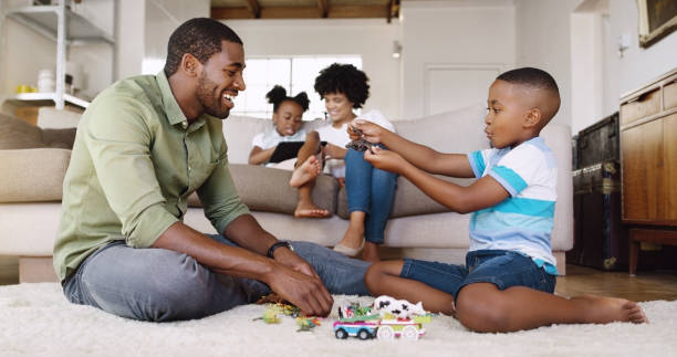 istock Spending the day indoors playing together 1047577970
