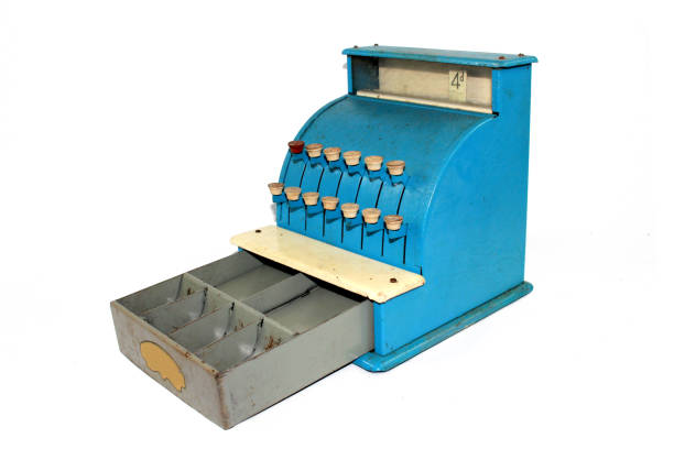 istock Old Fashioned Toy Till in Blue on White Background 1047581988
