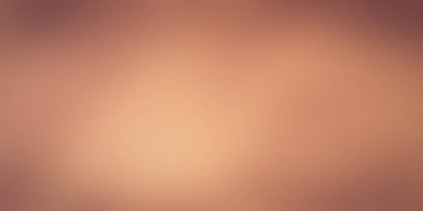 istock abstract blur softness beauty brown , sepia and tan colorful image gradient with dark edge effect filer background for design as ads , banner concept 1047585950