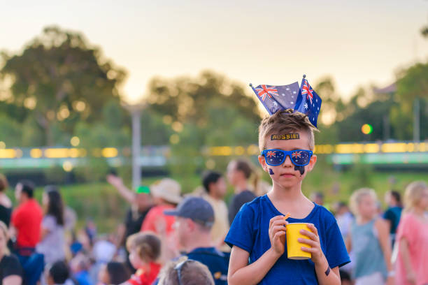 istock Cute Australian boy with flags and tattoos on his face 1047592672