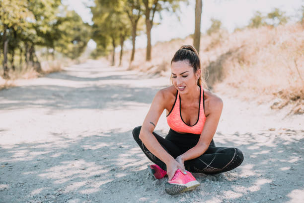 istock Young athlete stretching outdoors 1047603716