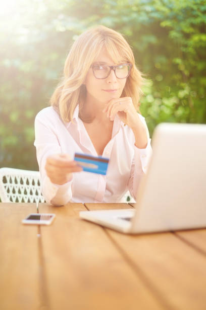 istock Woman paying online 1047606028