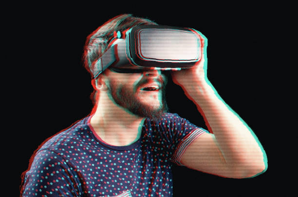 istock Man in VR-headset over glitch effect. Technology, gaming and entertainment concept 1047609786
