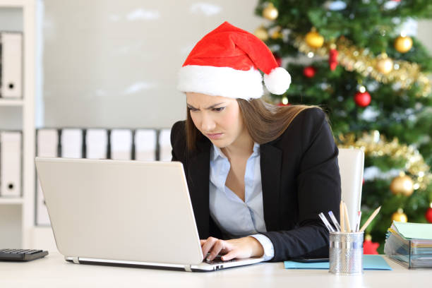 istock Angry employee working at office in christmas 1047610252