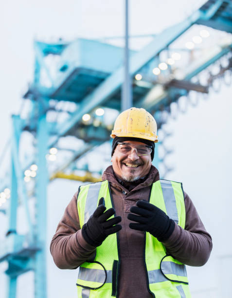 istock Hispanic dock worker at shipping port 1047616508