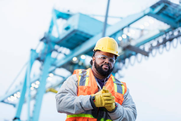 istock African-American dock worker at shipping port 1047616628