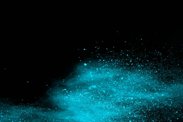 istock Blue powder explosion on black background. Colored cloud. Colorful dust explode. Paint Holi. 1047620140