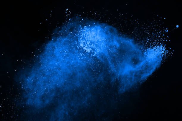 istock Blue powder explosion on black background. Colored cloud. Colorful dust explode. Paint Holi. 1047620176