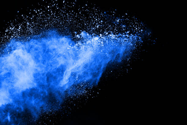 istock Blue powder explosion on black background. Colored cloud. Colorful dust explode. Paint Holi. 1047620186