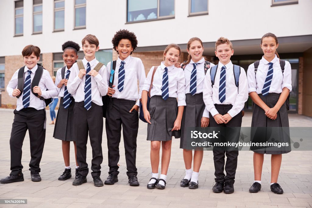 Portrait Of High School Student Group Wearing Uniform Standing Outside School Buildings School Uniform Stock Photo