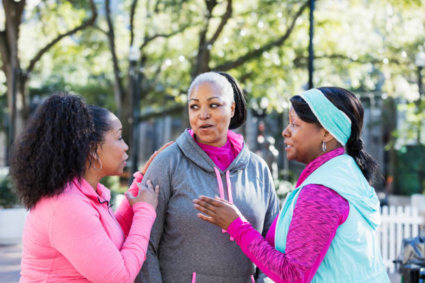 istock Three mature African-American women conversing 1047620784