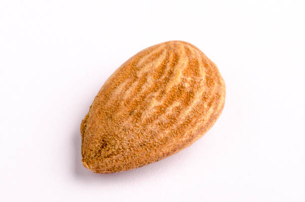 istock Organic Marcona almond with skin on white background 1047621026