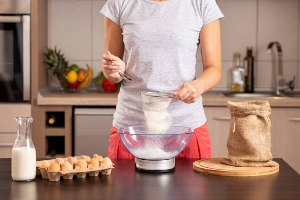 istock Woman measuring flour 1047621132