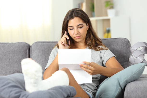 Disabled woman calling on phone about a letter