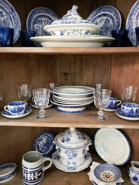 istock Antique Place Setting in Cabinet 1047624132