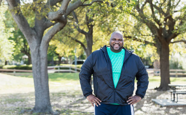 reifer afrikanisch-amerikanischer mann - fett stock-fotos und bilder