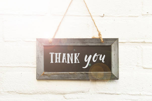 istock Thank you handwritten text on sign board card 1047627728