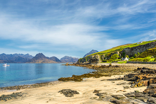 Holidays in Scotland -  panoramic view of Oban on the west coast of Scotland with the town, ferry terminals and hills in the background