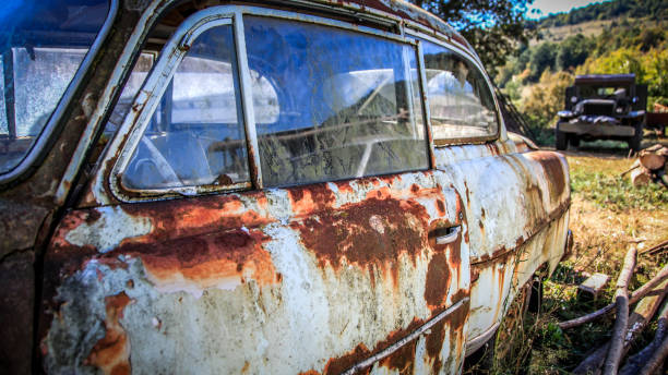 istock Rust oldtimer car - Ruined Cars on the Station 1047627980